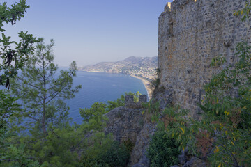 Fototapeta premium castle, architecture, medieval, tower, europe, fortress, spain, old, ancient, stone, building, wall, sky, travel, landscape, city, landmark, house, historic, hill, mountain, history, fortification, it