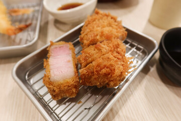 close up of Japanese deep fried tempura pork cutlet Tonkatsu 