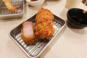 close up of Japanese deep fried tempura pork cutlet Tonkatsu 