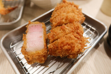 close up of Japanese deep fried tempura pork cutlet Tonkatsu 