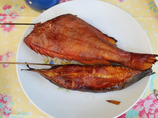 Fish - Smoking Fish smoked and cured - The fish - redfish and halibut were smoked in a smoker, hung and placed on the plate. Smoking is popular with hobby anglers and allotment gardeners
