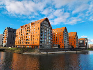 Gdansk, Poland  March 26, 2023: architecture of a modern city on the river bank. Gdansk, Poland