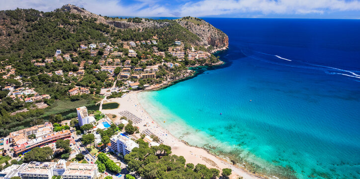 Mallorca (Majorca) island best beach destinations - scenic beautiful Canyamel beach with turquoise sea. aerial drone view. Spain summer holidays