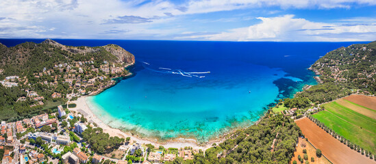 Naklejka premium Mallorca (Majorca) island best beach destinations - scenic beautiful Canyamel beach with turquoise sea. aerial drone panoramic view. Spain summer holidays