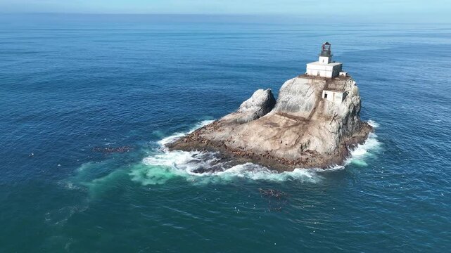 A lonely, deactivated lighthouse stands on Tillamook Rock off the rugged coast of northern Oregon. Originally commissioned in 1878, the remote lighthouse eventually earned the name "Terrible Tilly."
