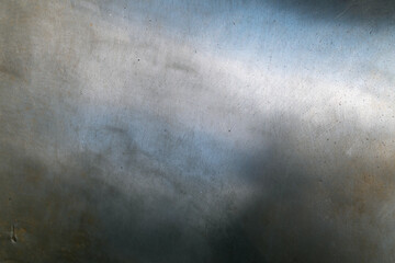 Close-up of scratched and weathered metal surface. Backgrounds