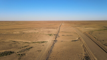 View of long dingo fence used to keep out dingoes in South Australia