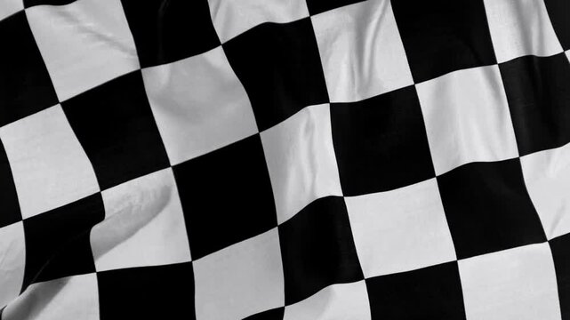 Checkered Race Flag . Slow Motion Wavy closeup fabric fluttering Racing Flag background . Formula One flag car motor sport .