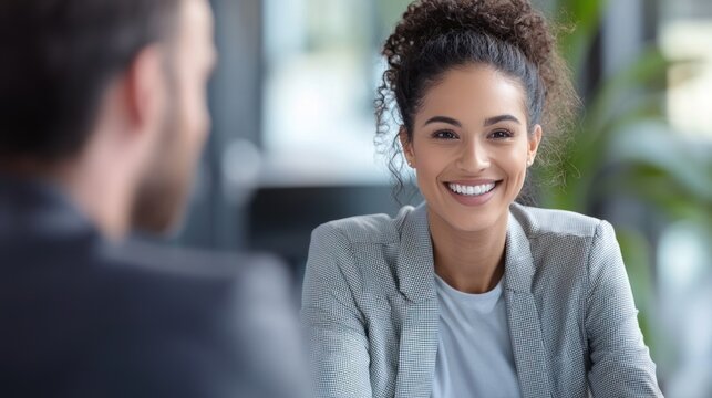 Customer service representative handling a challenging situation with a calm and professional attitude, smiling while interacting with a client