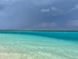 Tropical Destination - Maldives - Pier For Paradise Island, beach with clear blue water. Summer vacation background. Exotic island 