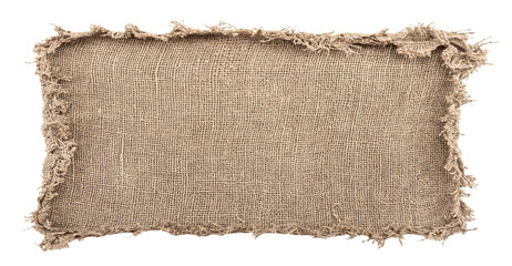 Burlap texture. A piece of torn burlap on a white background. Canvas. Packing material
