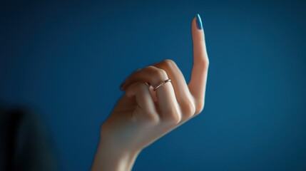Close-up of a Woman's Hand with Blue Nail Polish