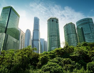 Obraz premium Overgrown skyscrapers amidst a lush, green landscape