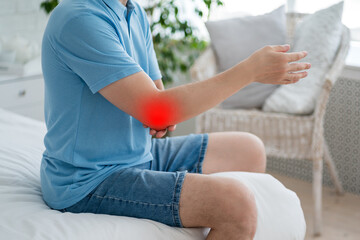 Fototapeta premium Diseases of the elbow joint, bone fracture and inflammation, man suffering from pain in cubit