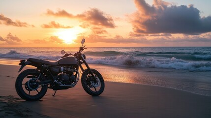 Fototapeta premium A motorcycle parked on a beach at sunrise, with the waves crashing in the background.
