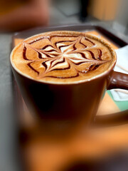 Hot Coffee in a mug with creative design