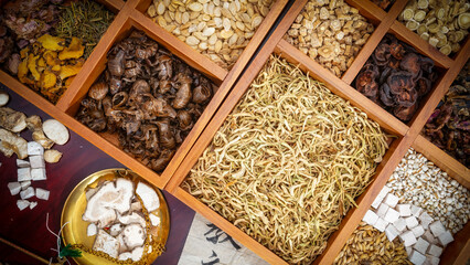 A Colorful Display of Traditional Herbal Remedies in Wooden Boxes