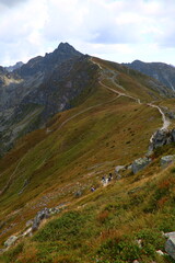 Fototapeta premium view of the trail winding through the mountain peaks