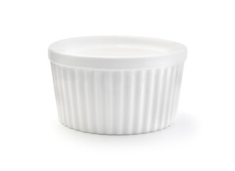 Ceramic ramekin isolated on white.