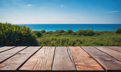A wooden deck overlooking a clear blue ocean on a sunny day