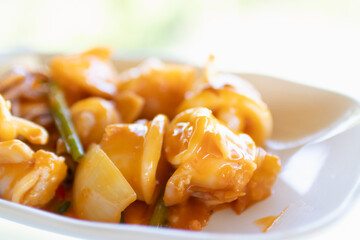 Stir fried squid with salted egg york. Delicious Thai dish.