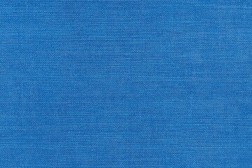 Textured blue cotton chambray fabric, showcasing a smooth and even weave pattern. The vibrant blue color adds a fresh and modern touch, suitable for various design applications.