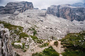 Visiting dolomites mountains in italia. Summer.