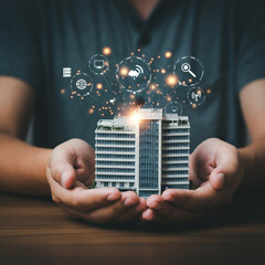Hands Holding Smart Building with IoT and Technology Icons