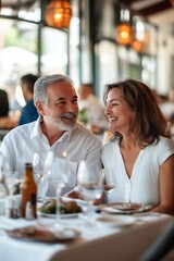 A couple is sitting at a table in a restaurant, smiling and enjoying their meal. The table is set with wine glasses, a bottle, and various utensils. The atmosphere is warm and inviting