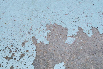 light blue paint peeling off concrete wall, old light blue wall painted background