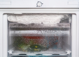 Kitchen freezer detail with frost