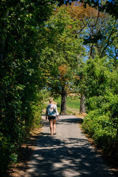 Woman walking in Austrian Wineyard