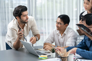 Data analysts team of office worker collaborate on business intelligence BI dashboard to analyze financial, trend, and marketing data. BI software utilization drive business success. Prudent