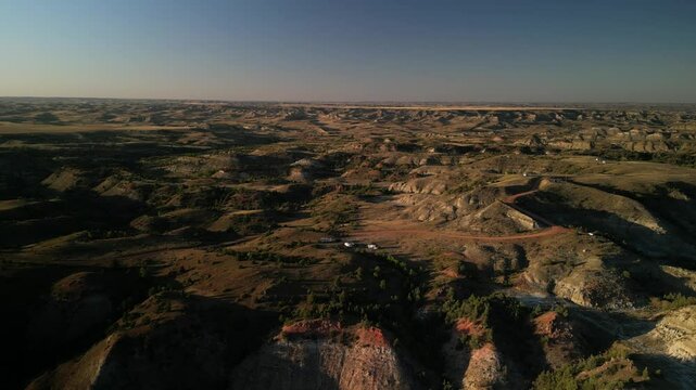 Aerial of RVs camping at sunset in Medora North Dakota badlands