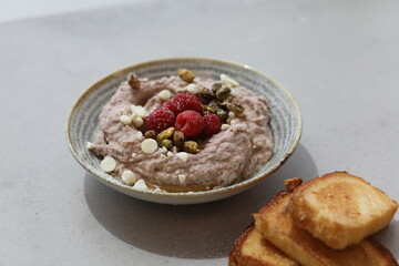 Raspberry Pistachio Oatmeal with White Chocolate Chips and Toast - Gourmet Breakfast Bowl