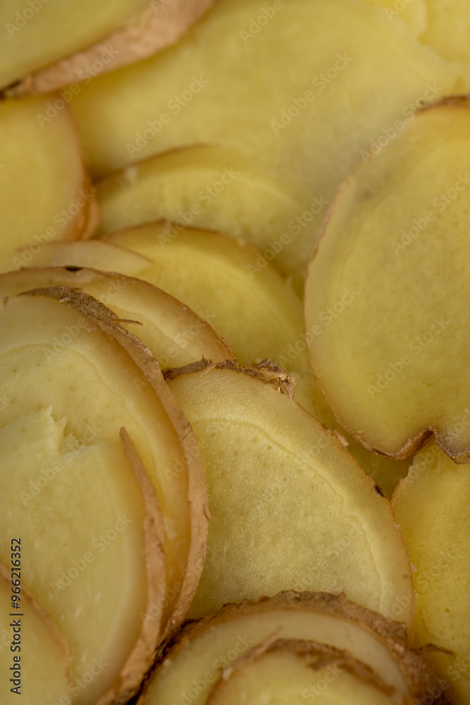 Wall mural details of the ginger root used in cooking sliced into pieces