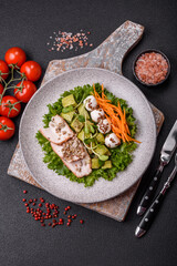 Delicious diet salad with turkey or chicken slices, lettuce, carrots, mozzarella