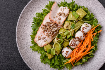 Delicious diet salad with turkey or chicken slices, lettuce, carrots, mozzarella