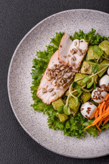 Delicious diet salad with turkey or chicken slices, lettuce, carrots, mozzarella