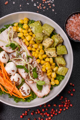 Delicious diet salad with turkey or chicken slices, lettuce, carrots, mozzarella