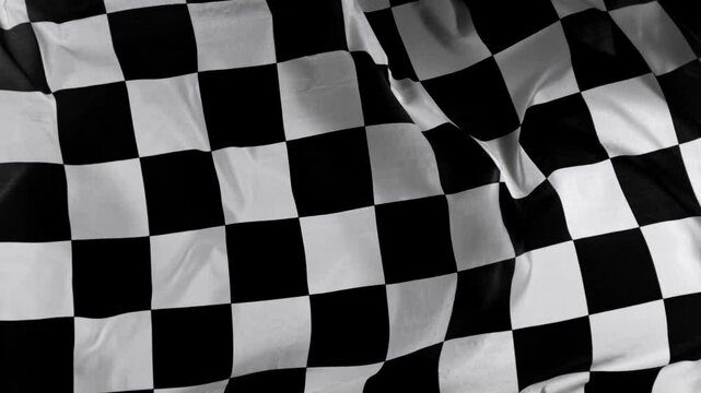 Checkered Race Flag . Slow Motion Wavy closeup fabric fluttering Racing Flag background . Formula One flag car motor sport .