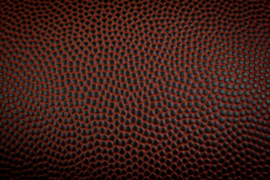 Leather texture grip of an American football