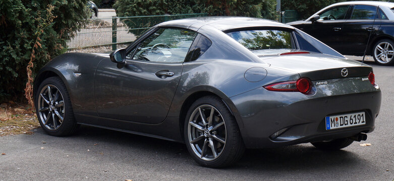 Sendenhorst - Germany Aug 13 2018 A dark gray Mazda MX5 is parked
