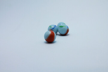 isolated white marbles with colorful patterns