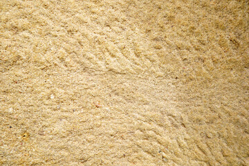 Brown rough stone wall for abstract background and texture for interior or exterior design. Beautiful patterns, space for work, banner, wallpaper close up.