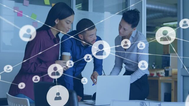 Animation of network of connections with icons over diverse colleagues discussing work in office