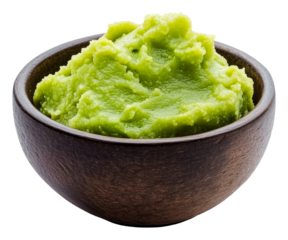 PNG Fresh green wasabi paste served in a wooden bowl
