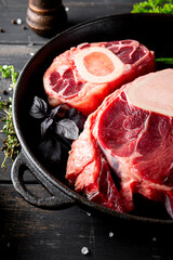  Raw osso buco beef and spices for its preparation close up