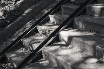 Old concrete steps with rails for a baby carriage