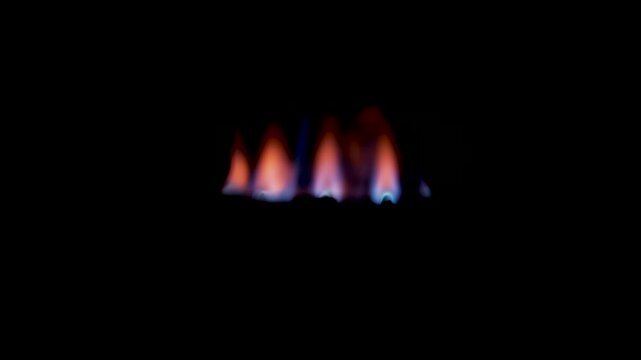 Blue and orange flames burning in slow motion